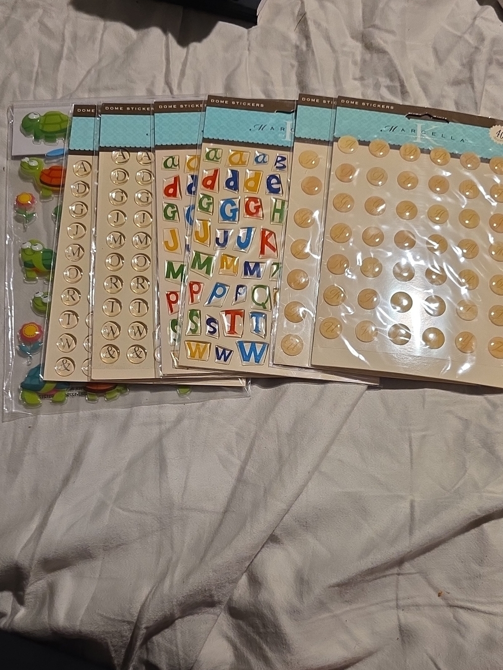 Set Of 7 MARELLA Gold and Multicolor Dome Alphabet & Dot Stickers.